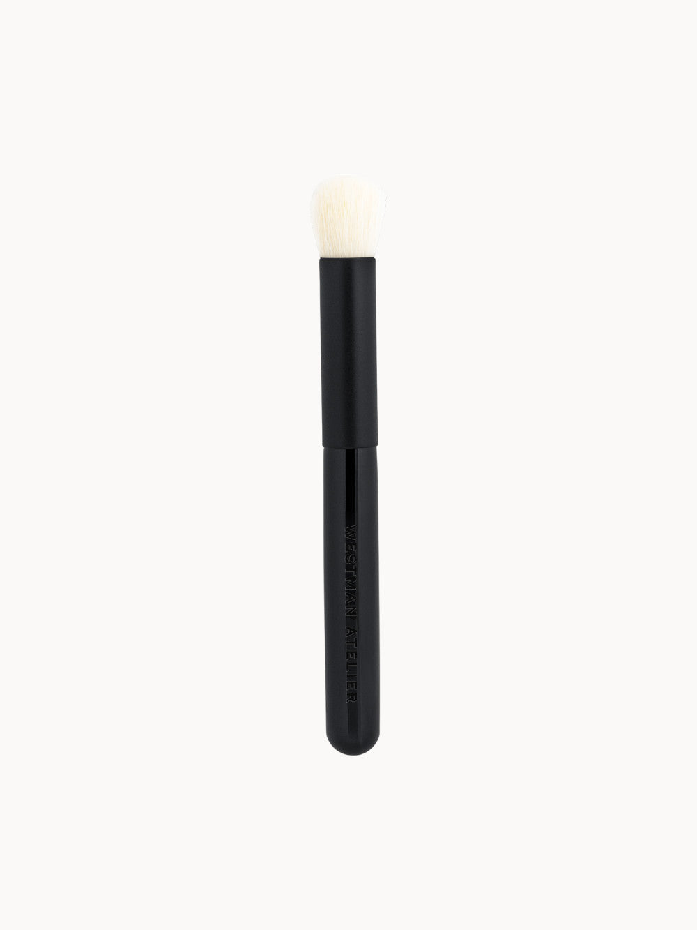 Baby Blender Brush von Westman Atelier mit abgerundetem Pinselkopf und schwarzem Griff – ideal zum Auftragen von Rouge und cremigen Texturen.