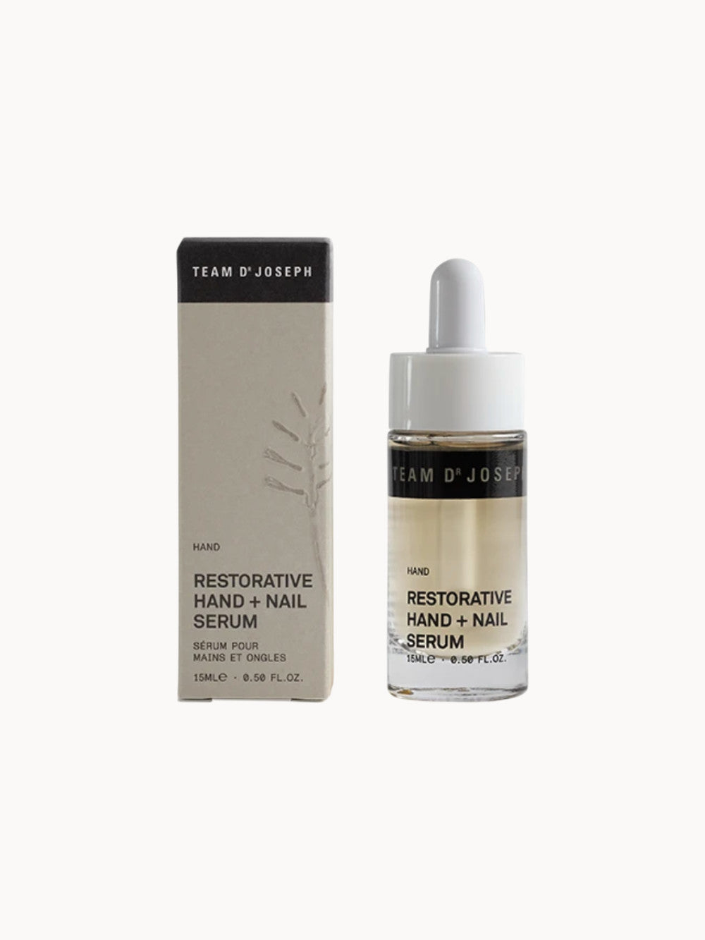 Team Dr. Joseph Restorative Hand + Nail Serum – Flasche mit Pipette neben Produktverpackung, 15 ml Pflege für Hände und Nägel.