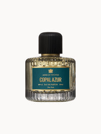 Flakon des AEDES DE VENUSTAS COPAL AZUR Eau de Parfum – 100 ml – elegantes, geriffeltes Glas mit tiefgrünem Etikett, goldener Schrift und schwarzem, gerilltem Verschluss.