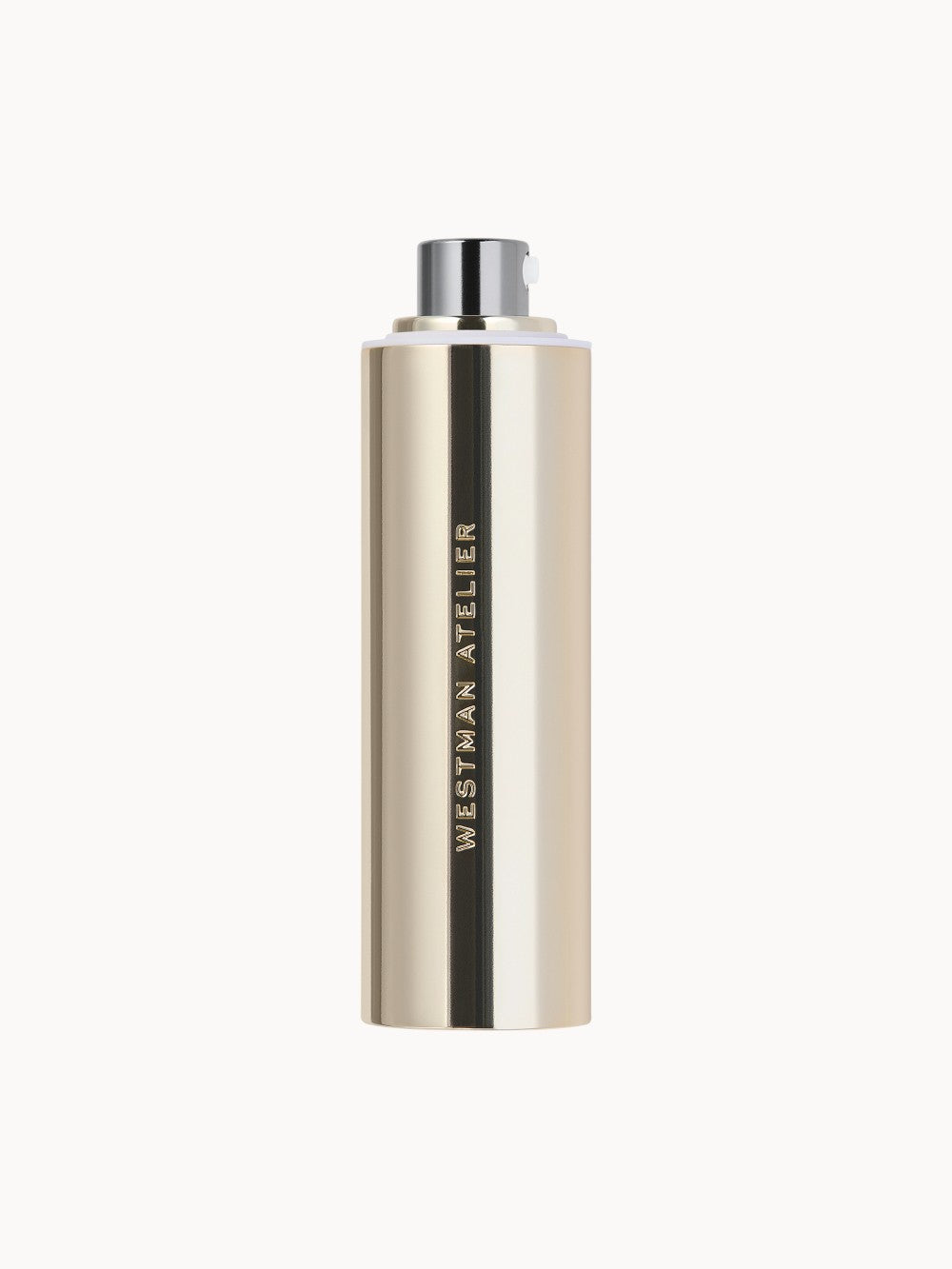 Zylindrischer Pumpspender in metallischem Gold mit schwarzem Mittelstreifen, Aufschrift „Westman Atelier“. Produktverpackung für ein Vitamin-C-Konzentrat.